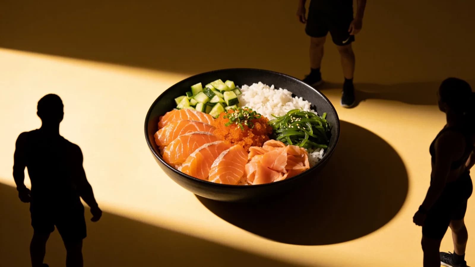 A salmon poke bowl in hard light